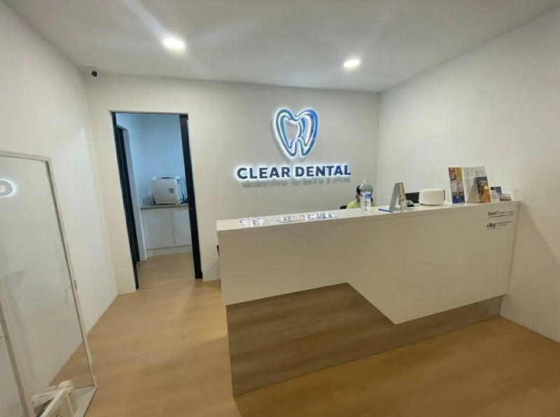 Custom illuminated dental reception wall sign for Clear Dental – Perth, WA – Neon Brothers